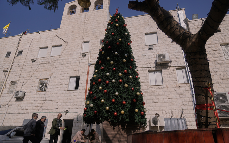 3 Palestinians arrested on suspicion of torching a Christmas tree at a Catholic church in West Bank