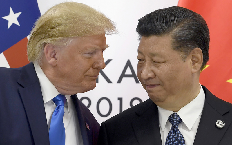 Trump says after Xi call that US and China will resume trade talks