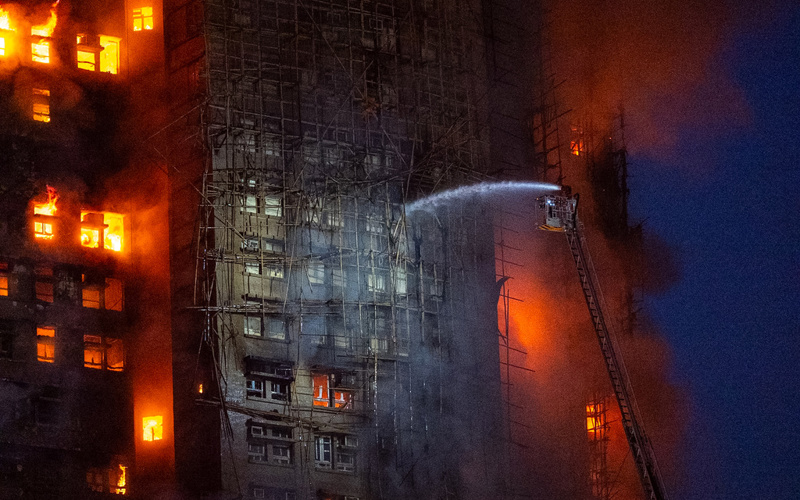13 people killed in fire engulfing Hong Kong high-rise