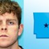 Arkansas teacher charged with murdering couple on hiking trail