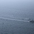 Iran fires on ships in Strait of Hormuz as Tehran imposes restrictions again
