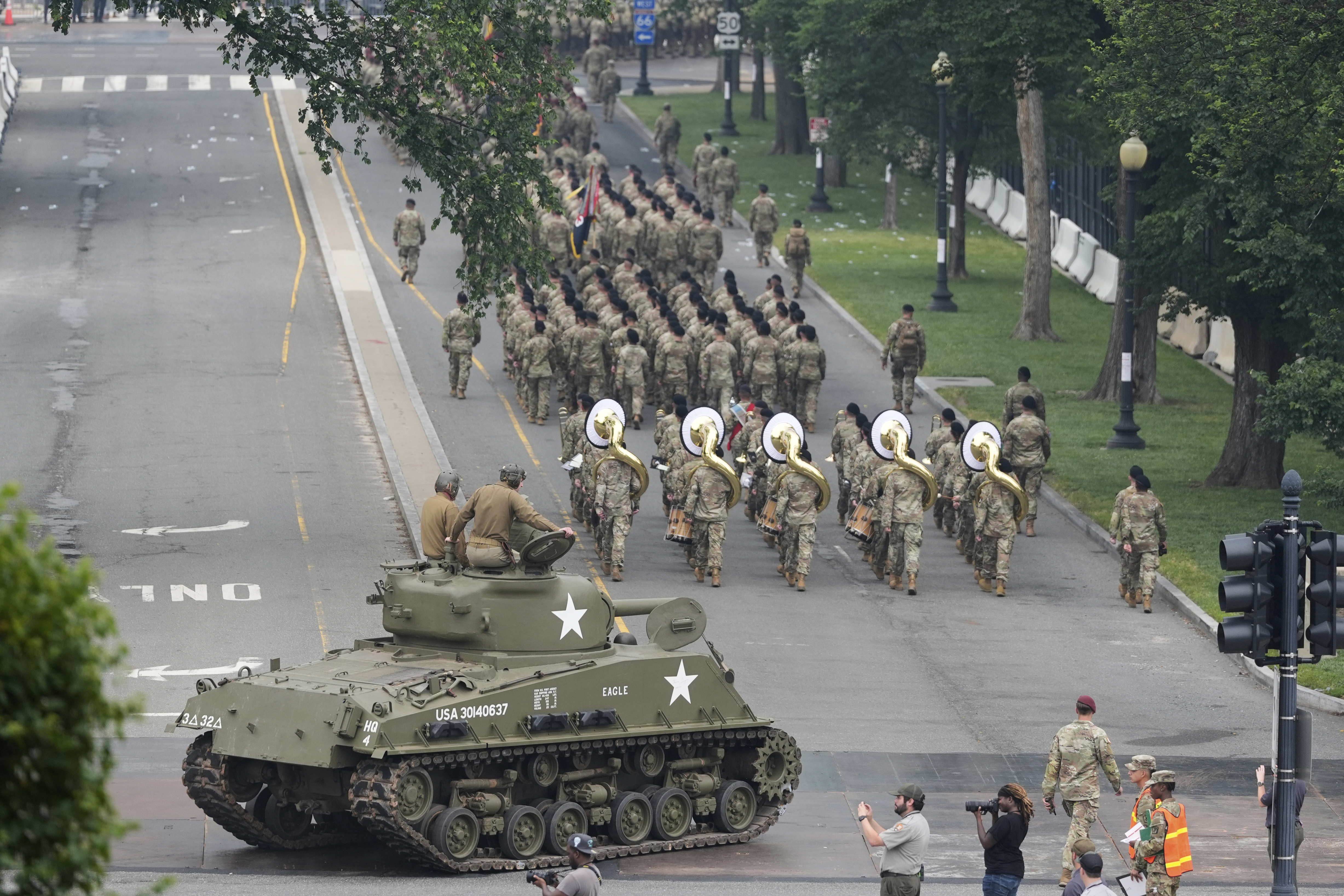 Military parade barrels through nation's capital with tanks, troops and 21-gun salute
