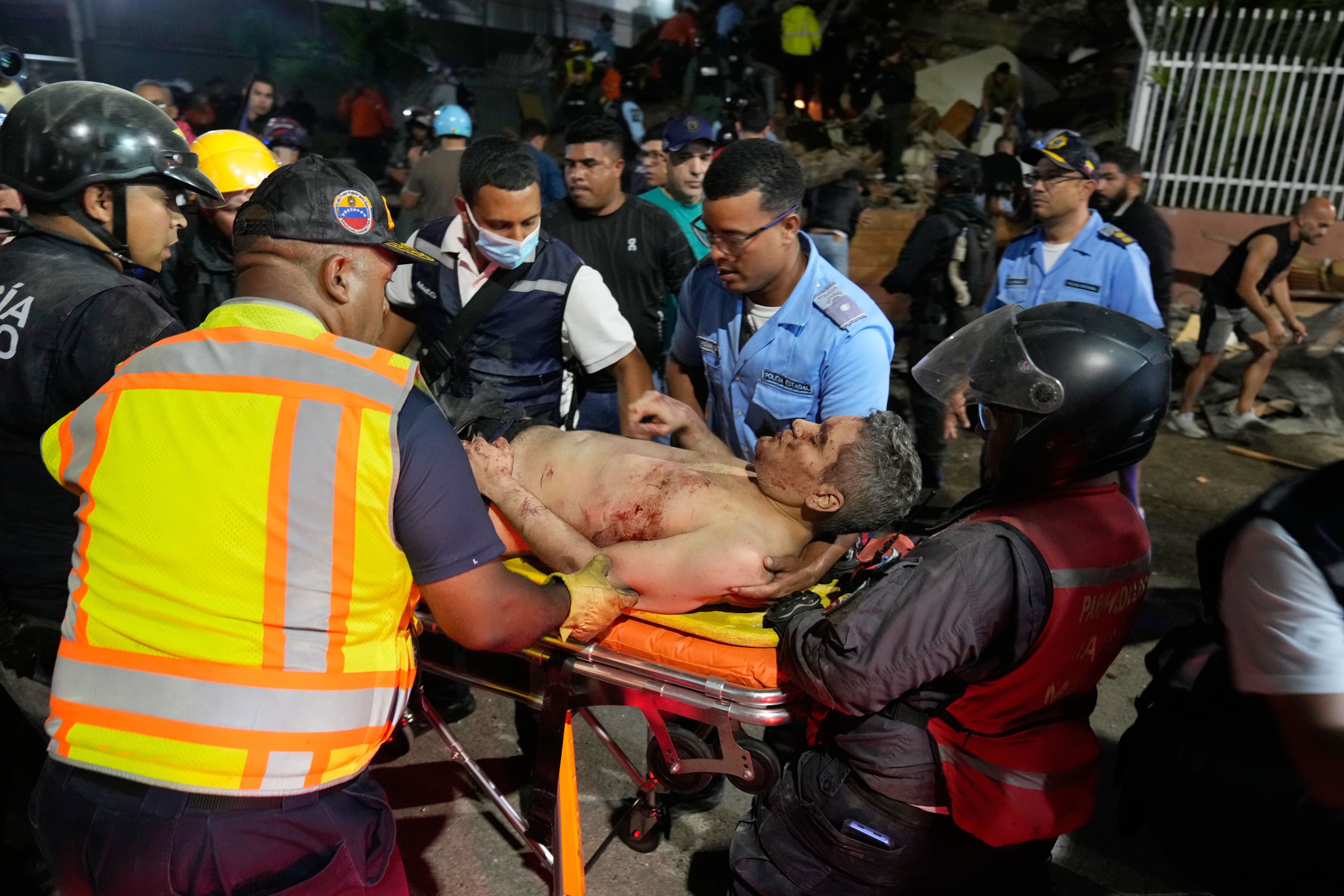 At least 164 dead and 971 injured after powerful quakes rock Venezuela, acting president says