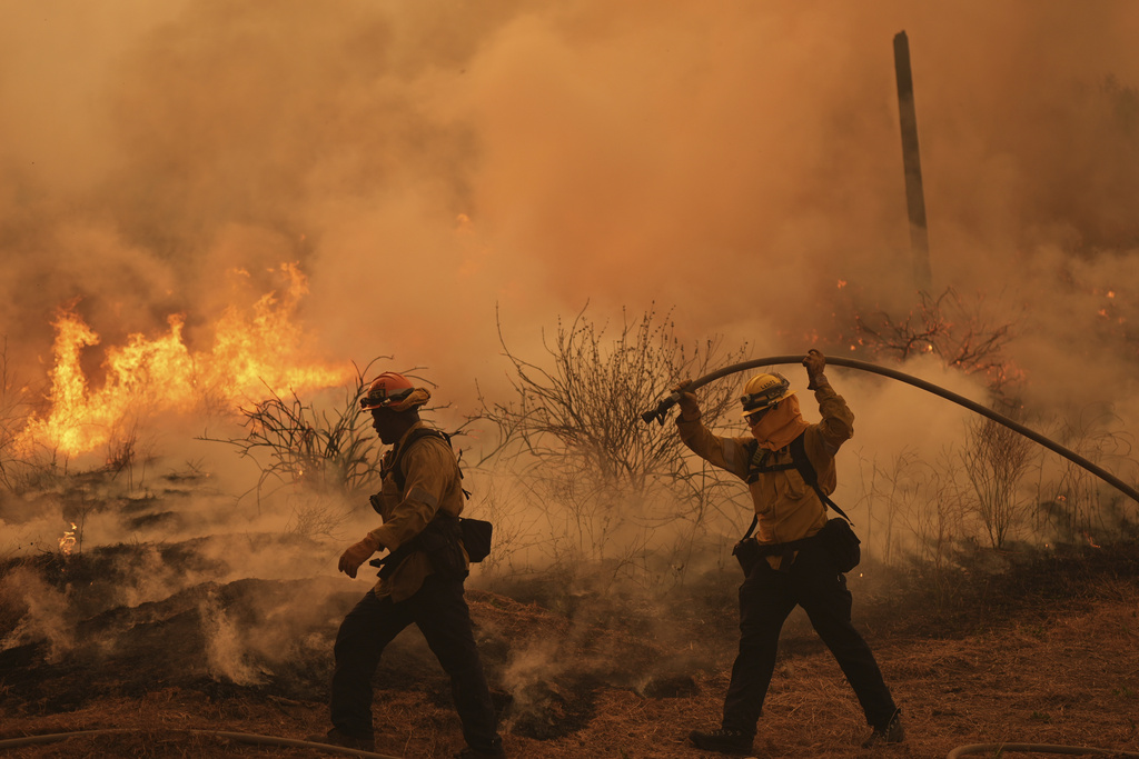 Colorado prison evacuated as growing wildfire becomes one of the largest in state history