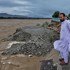 Flash floods in Pakistan kill 8 after deluge sweeps away dozens