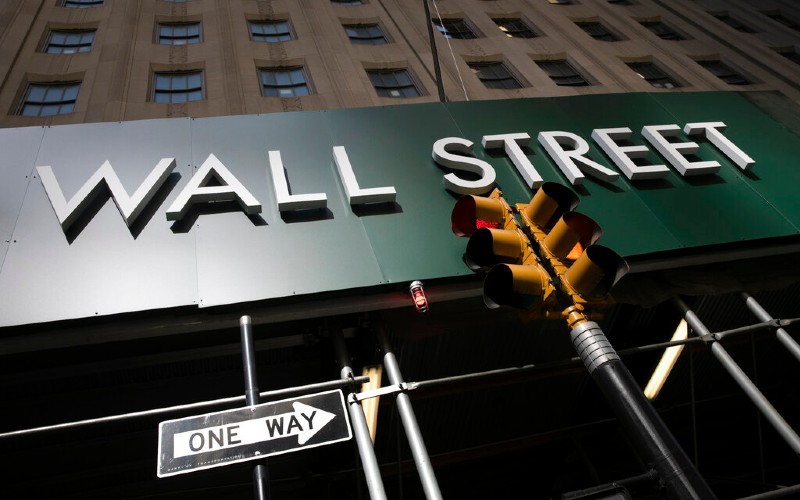 US stocks near their record as oil prices tumble and stocks rally worldwide