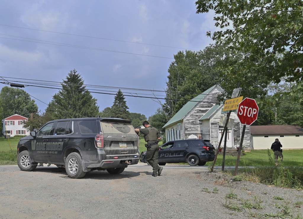 Pennsylvania man kills neighbor and wounds responding troopers in gunfire ambush
