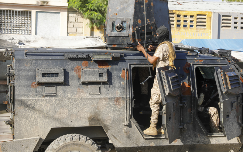 Haitian police arrest a former senator accused of working with gangs to attack a peaceful community