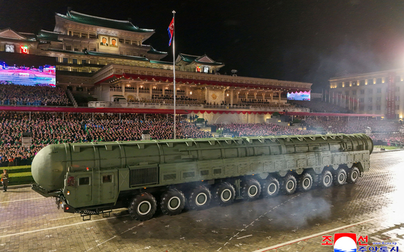 North Korea displays new long-range missile at a military parade celebrating Kim Jong Un