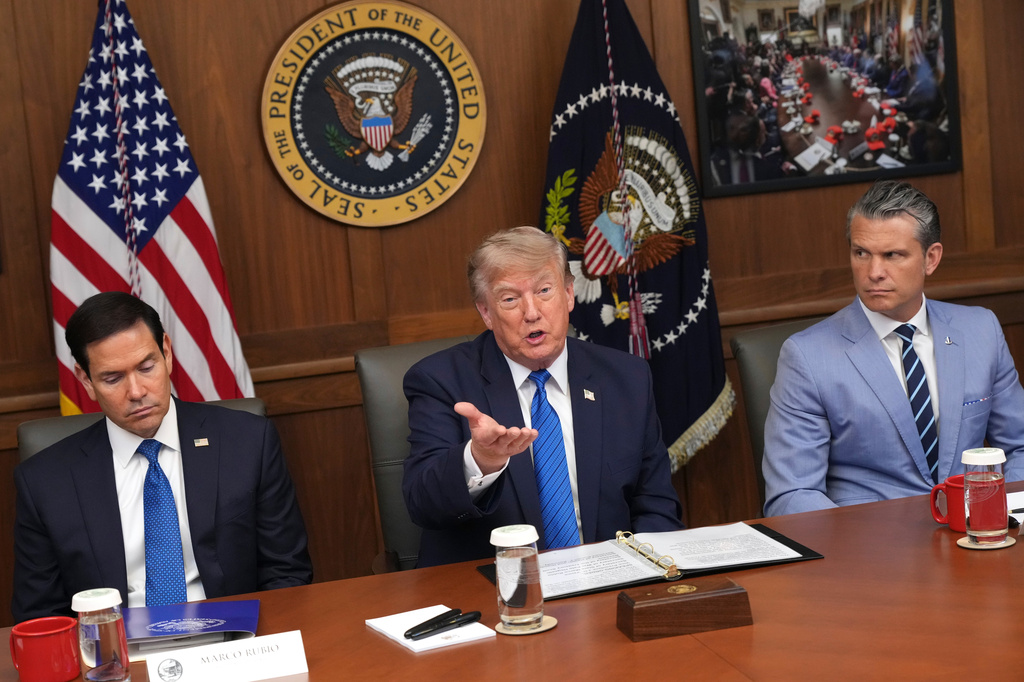 Trump hails a 'unique' Cabinet meeting at Camp David as he seizes on Spain's migration crisis
