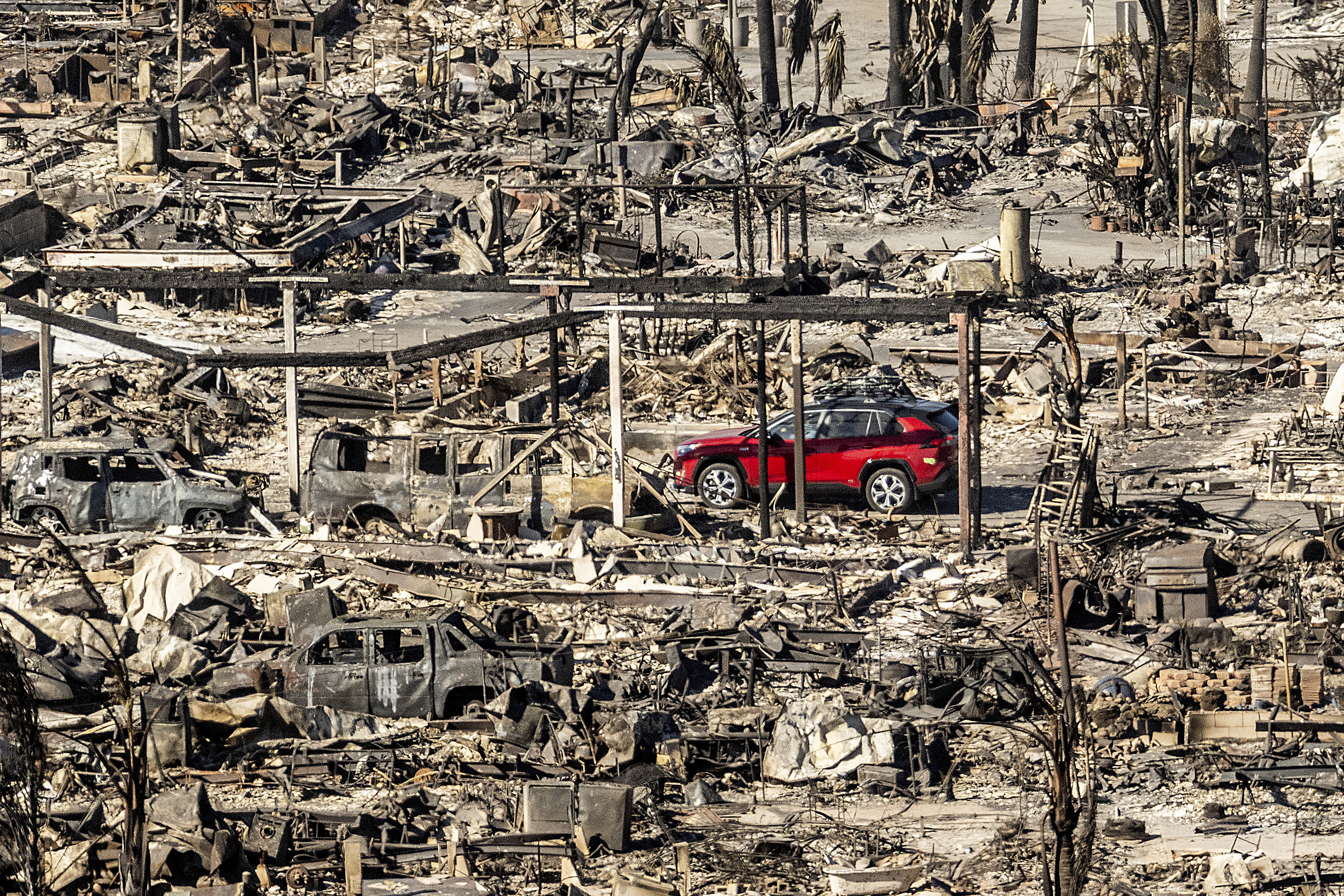 16 dead, 16 missing as fire crews try to corral Los Angeles blazes before winds return this week