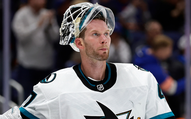 Knowing the danger, a Sharks goalie swims against the current