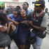 Haiti gangs fire on journalists covering a planned hospital reopening, leaving casualties